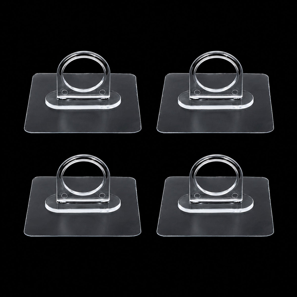 Adhesive plastic wall hook 4-piece set mounted on wall for home organisation
