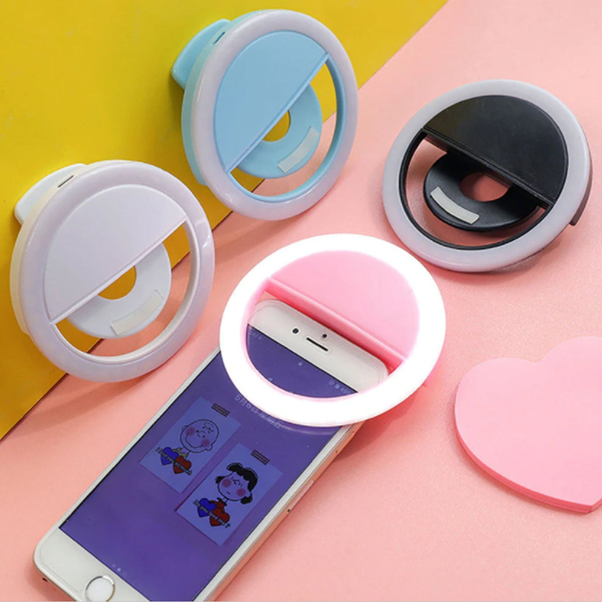 LED ring light for selfies showing its simple button controls and power input.