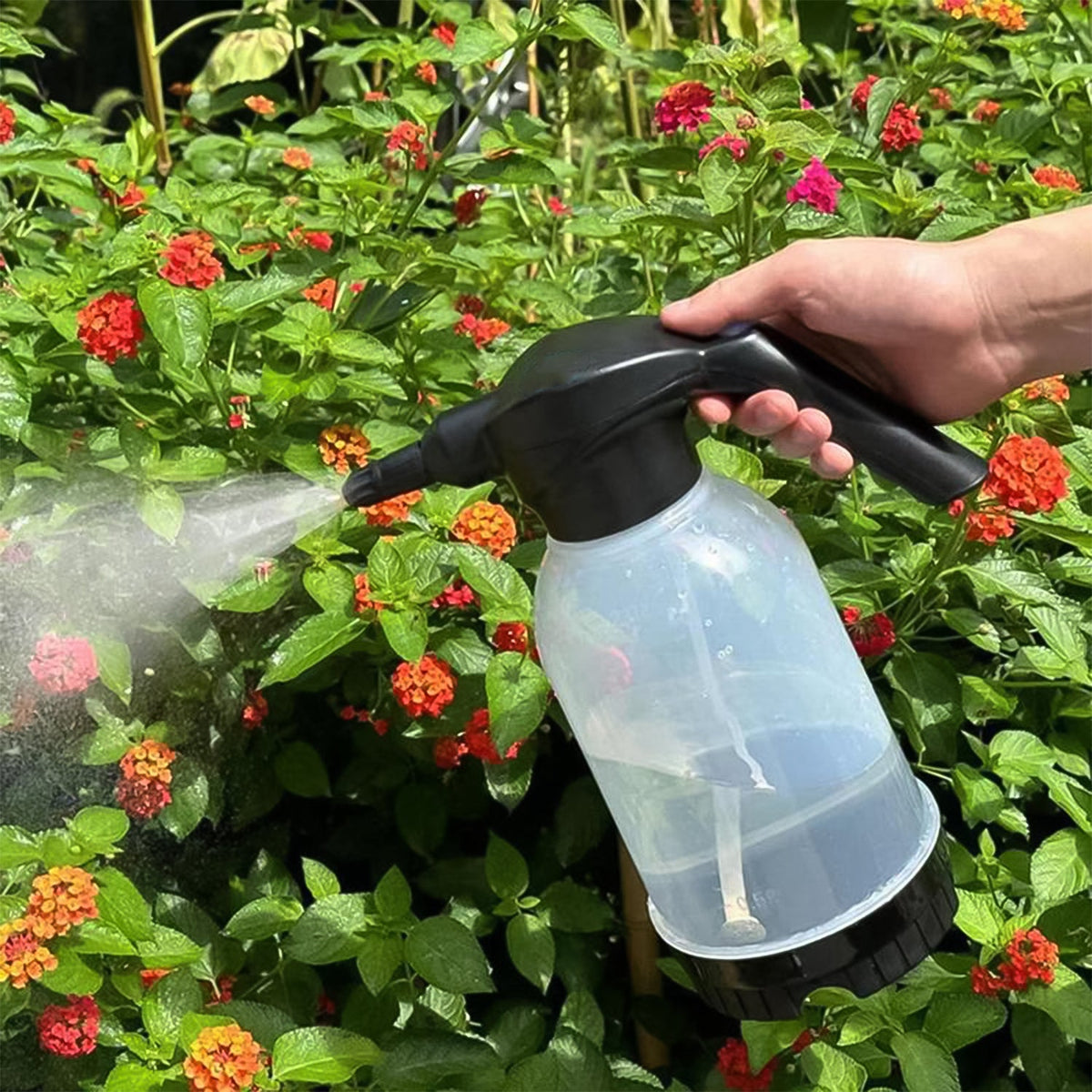 Automatic electric sprayer bottle with ergonomic handle for comfortable use.