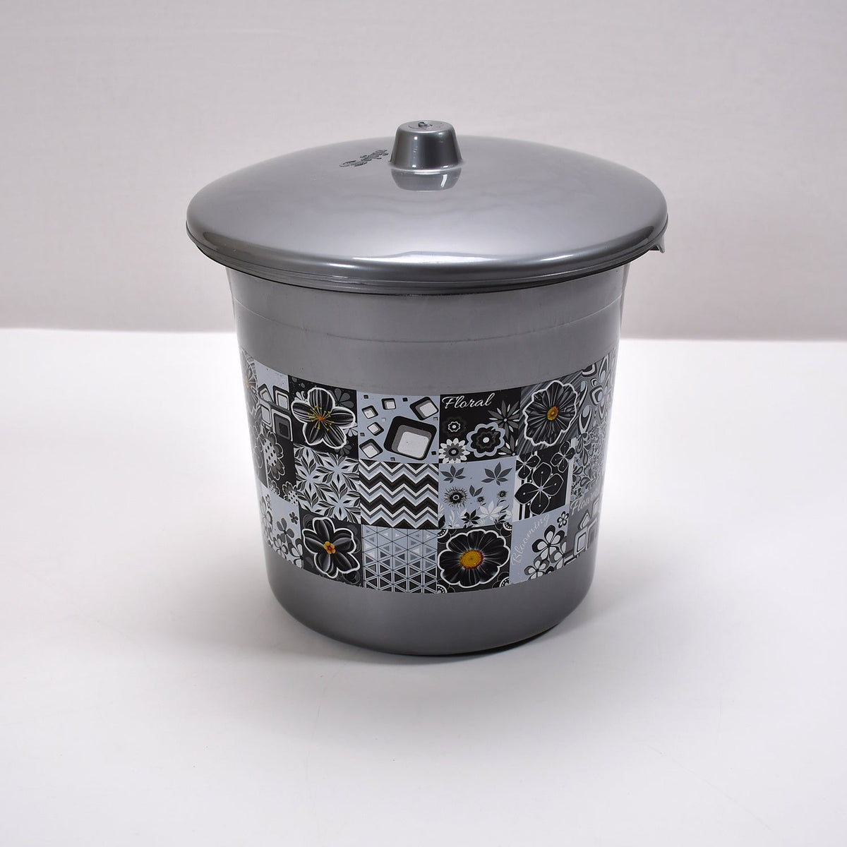 Detailed shot of the plastic bathroom accessories, emphasizing the quality and finish of the set.