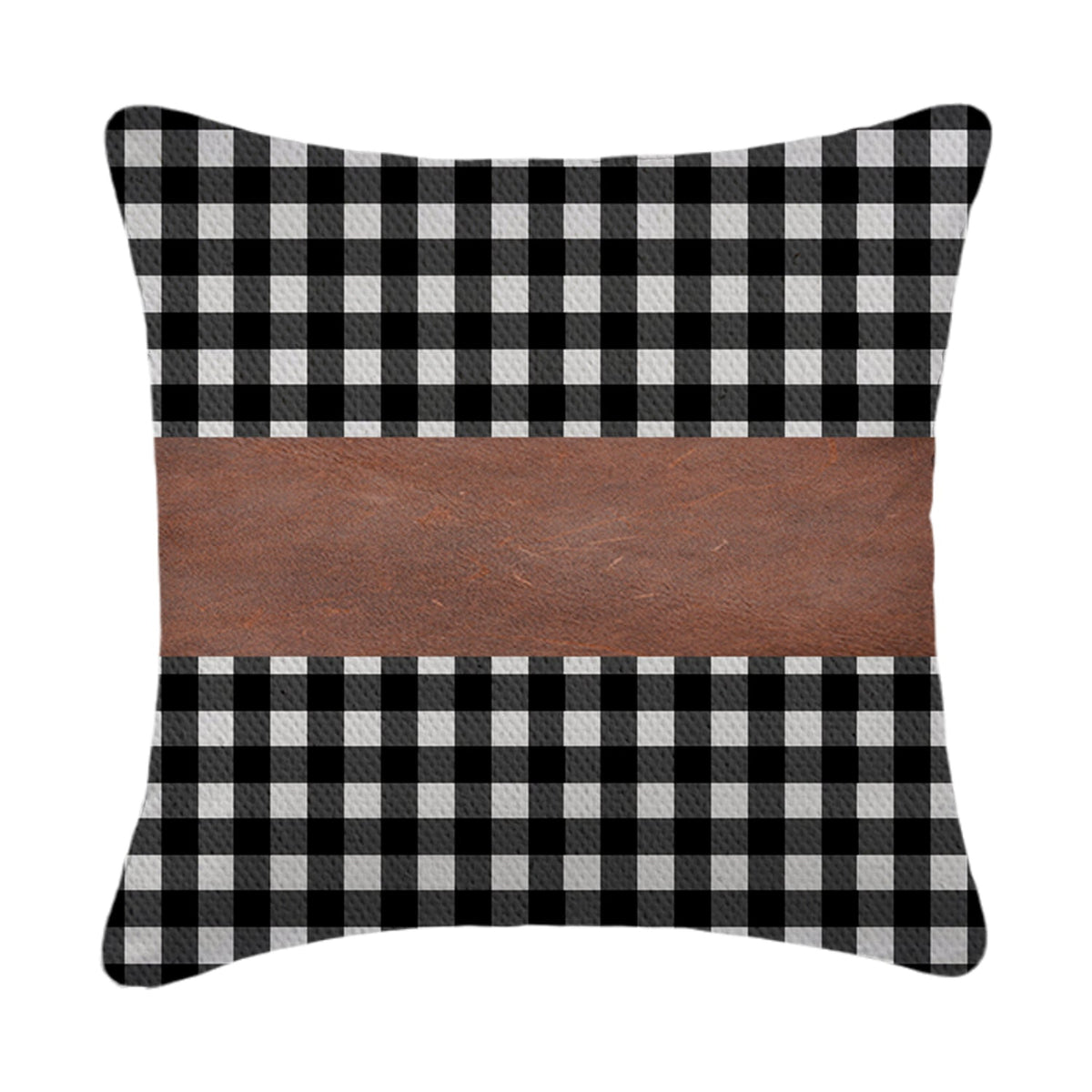 A set of contemporary leather pillow covers arranged on a comfortable armchair.