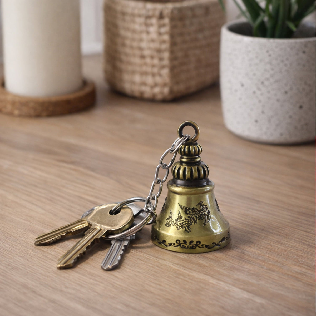 Close-up detail of ringing temple bell on metal keychain