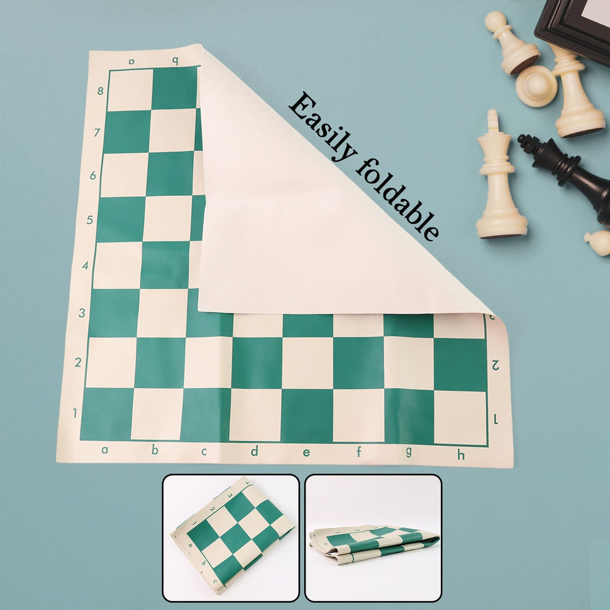 Portable vinyl chessboard spread out with plastic chess pieces arranged