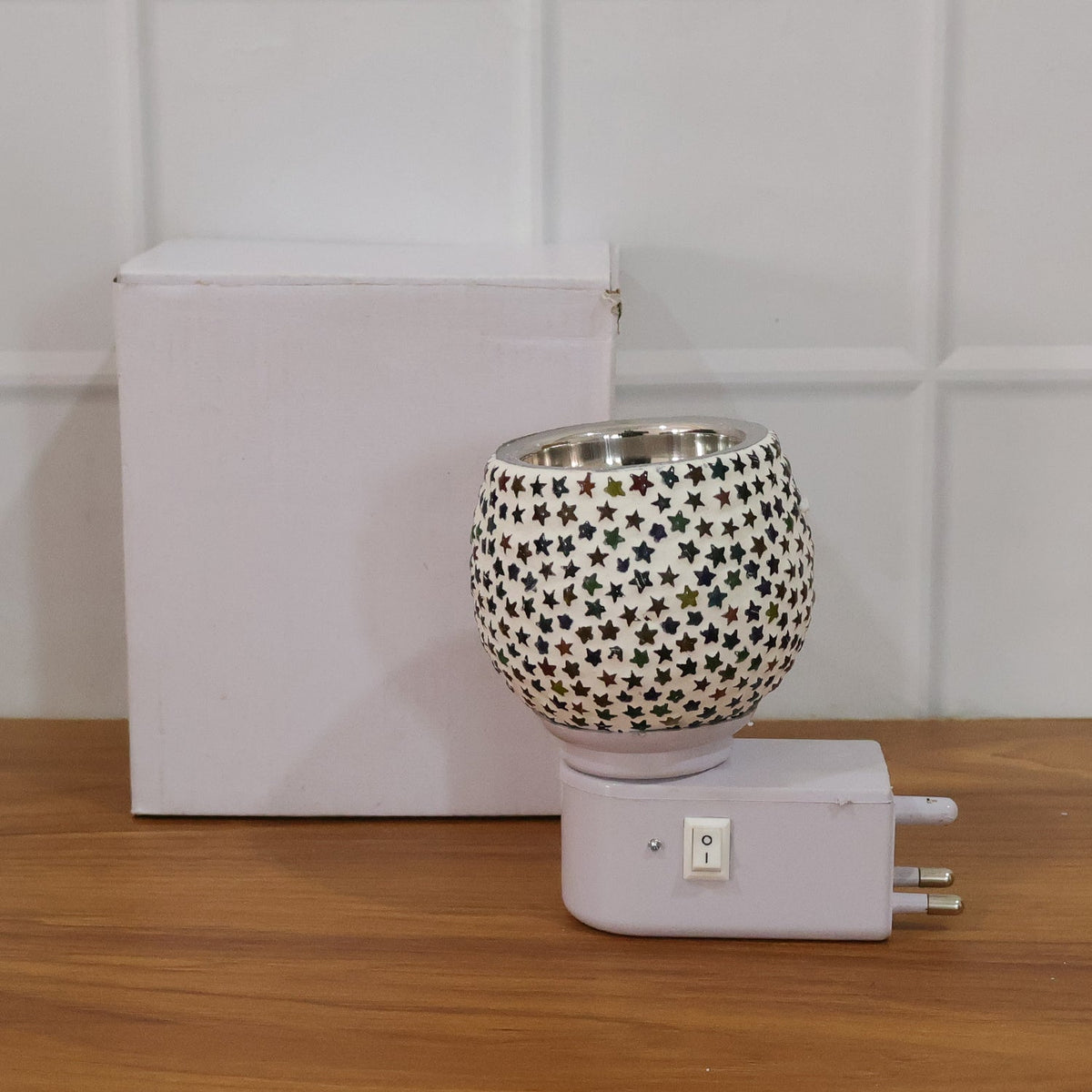 Star pattern night lamp casting calming star-shaped wall light patterns