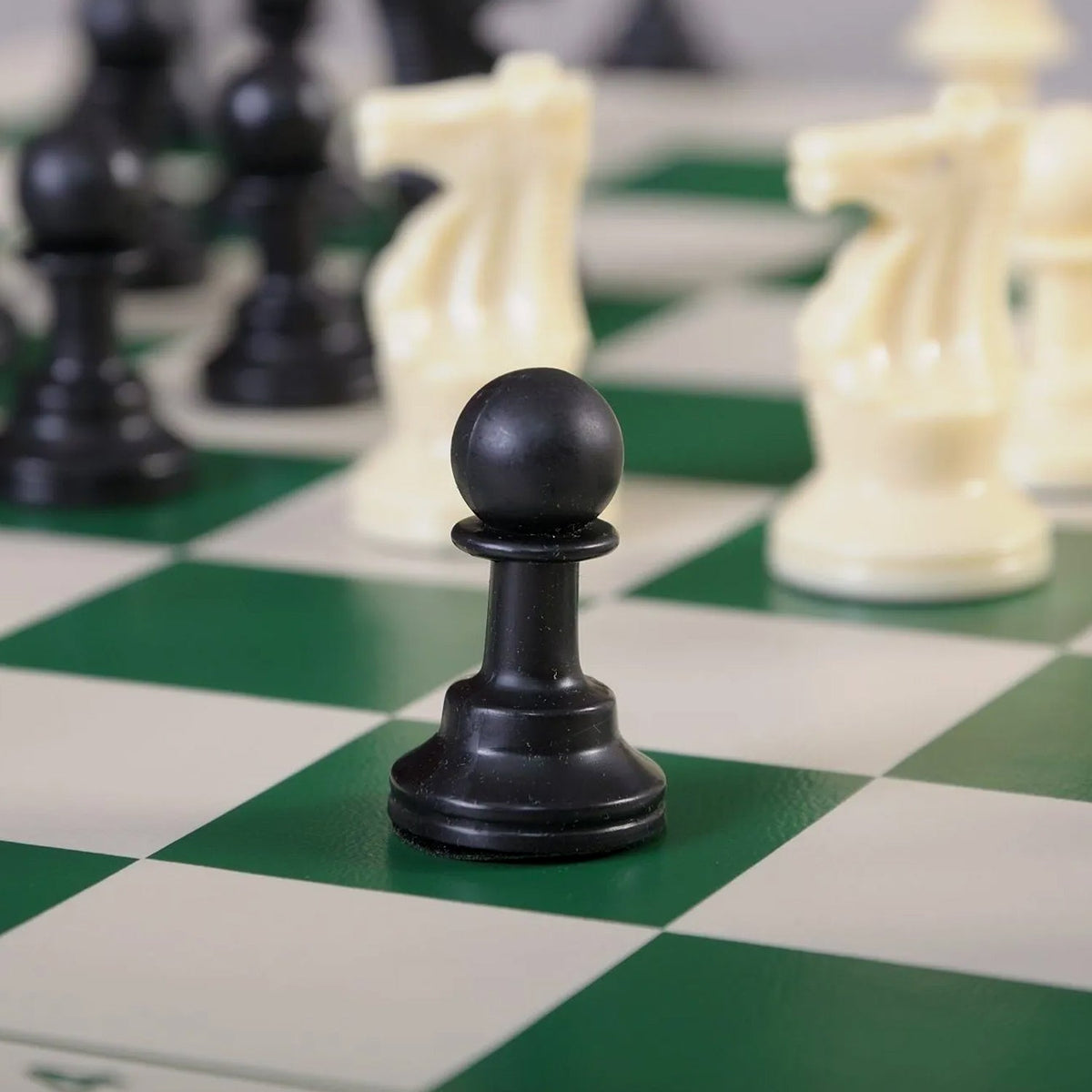 Foldable portable chess set with durable vinyl board and plastic chessmen