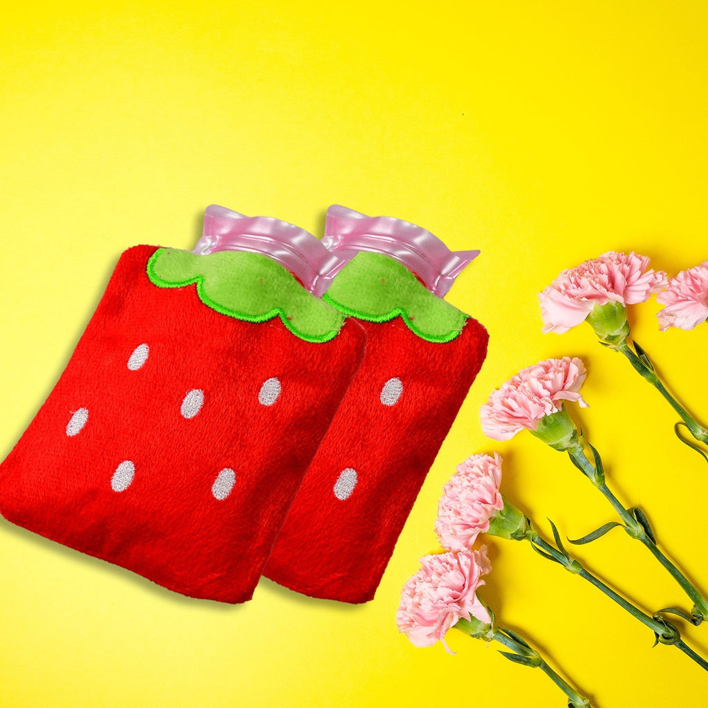 Three strawberry design heating bags in different sizes, showcasing the pattern.