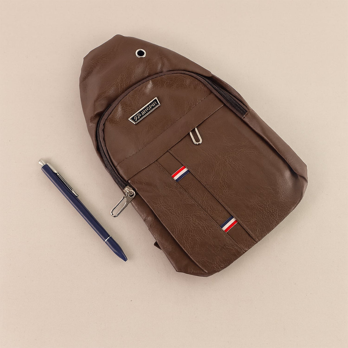 Comparison shot of the FERVENT anti-theft cross-body bag, demonstrating its ergonomic shape.