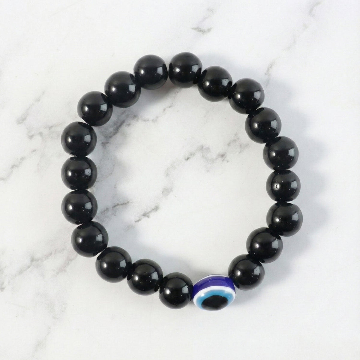 Detailed view of transparent crystal beads on elegant stretch bracelet