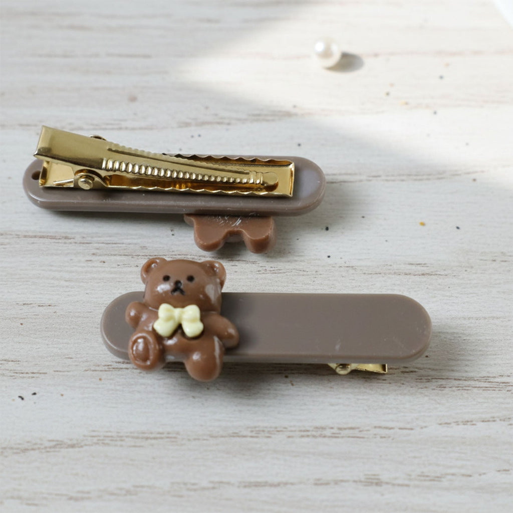 Collection of pastel-toned teddy bear hair clips laid out