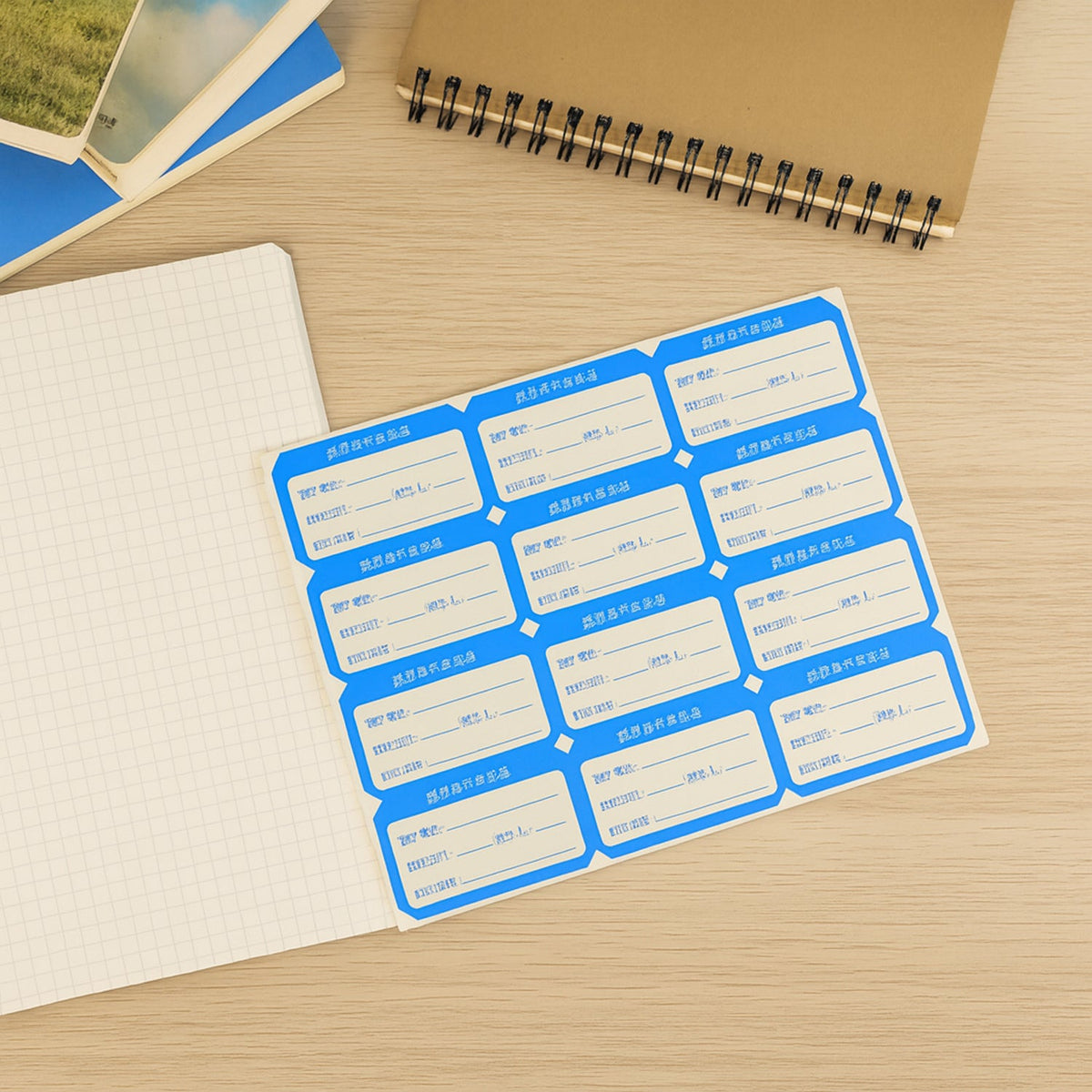 Blank writable shipping label sticker sheets displayed on multiple sheets