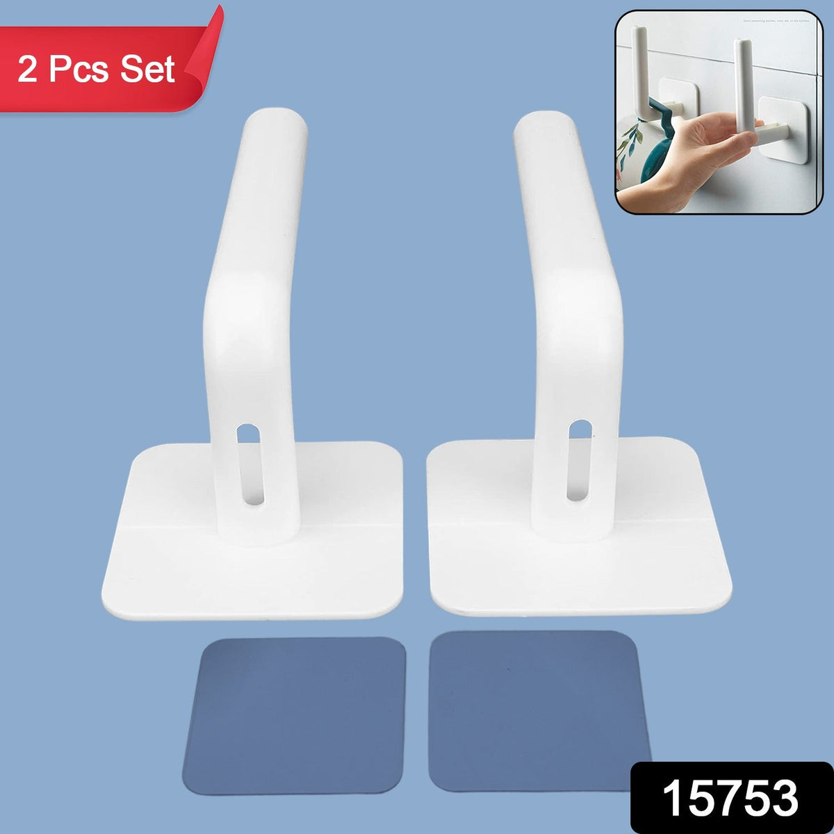 Close-up of the white hanging storage rack showing its drain holes and capacity for small items like sponges or toiletries.