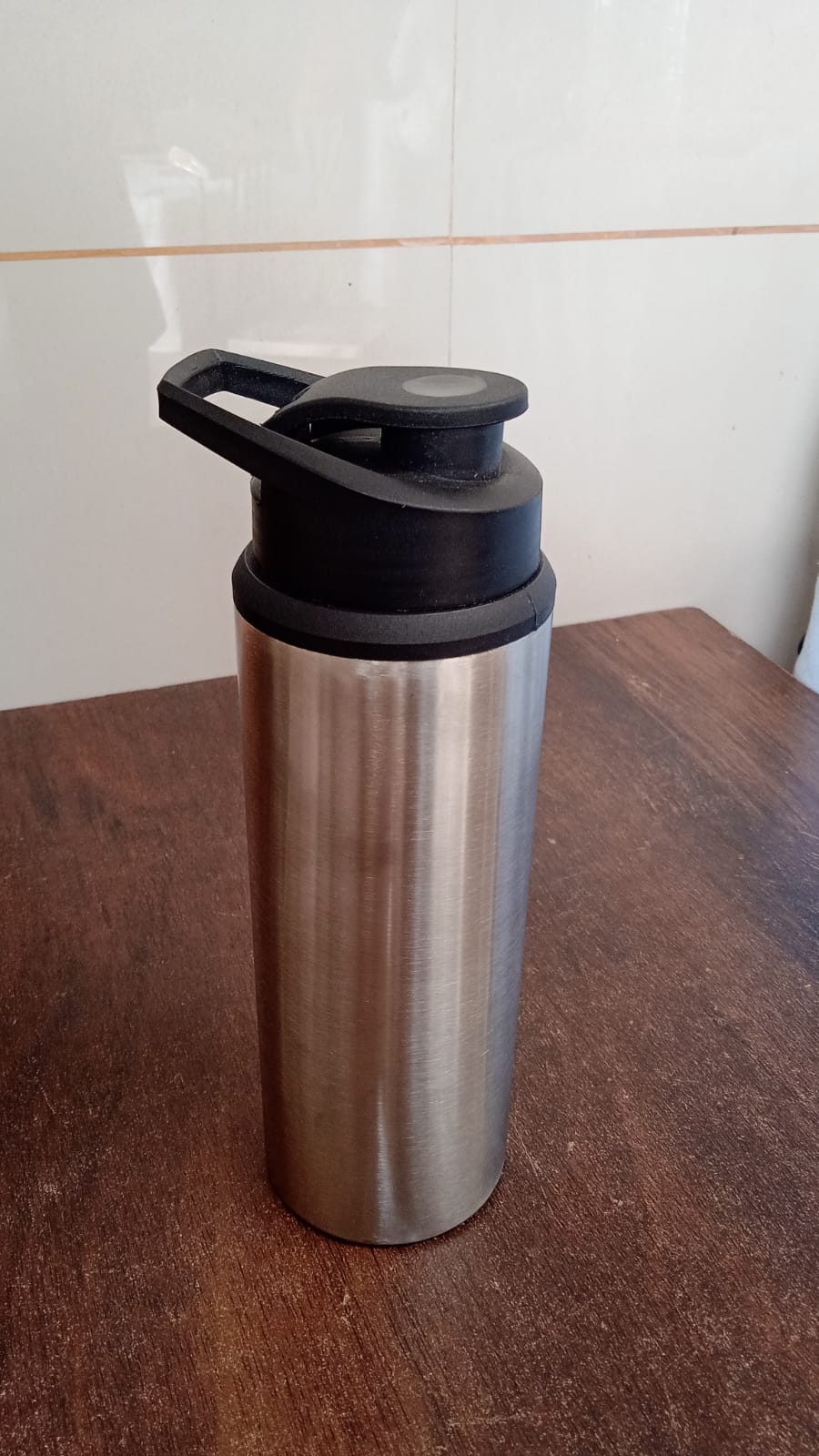 The Own Hydrate steel water bottle displayed against a clean background, highlighting its minimalist design.