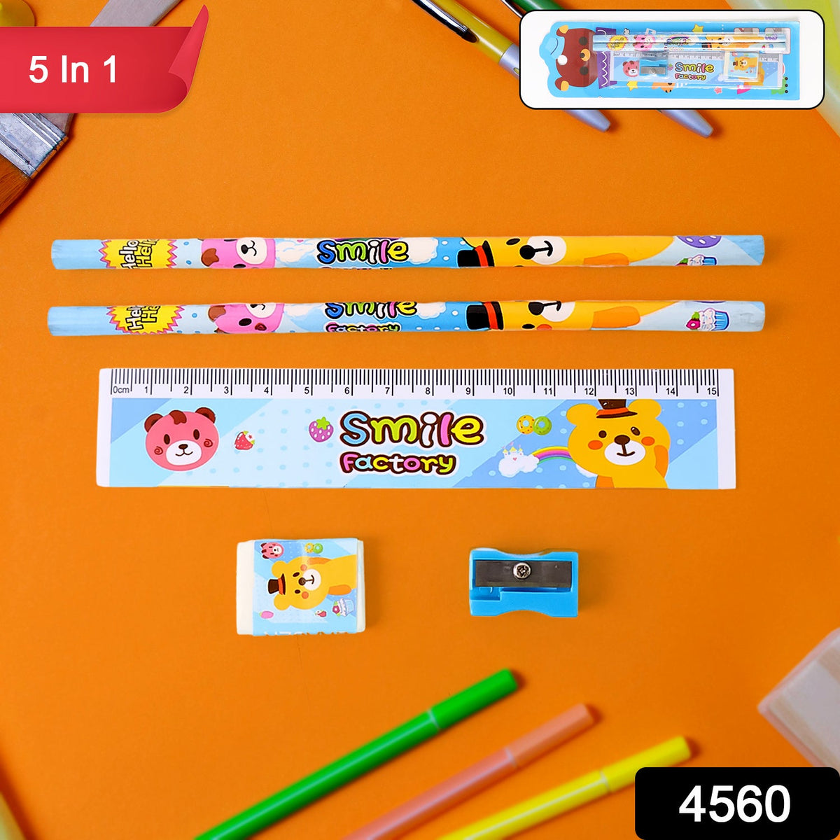 Close-up of a wooden pencil, ruler, and sharpener with playful prints.